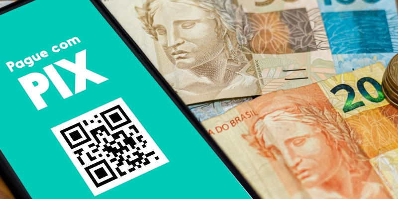 Um celular com um qr code e o texto 